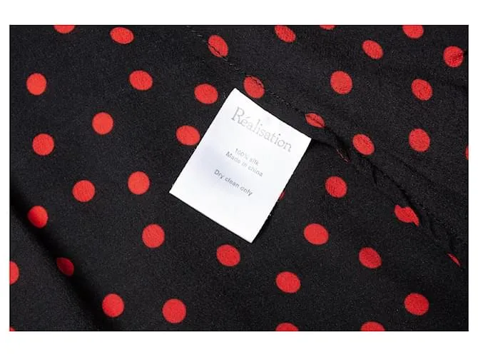 Autre Marque Realización, vestido cruzado negro con lunares 