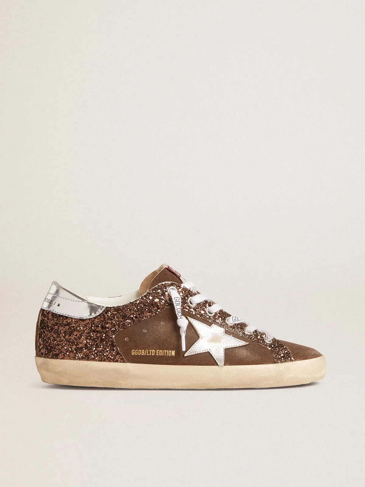 SUPERSTAR LTD CON PURPURINA MARRóN Y ANTE, CON ESTRELLA Y REFUERZO DEL TALóN DE PIEL
