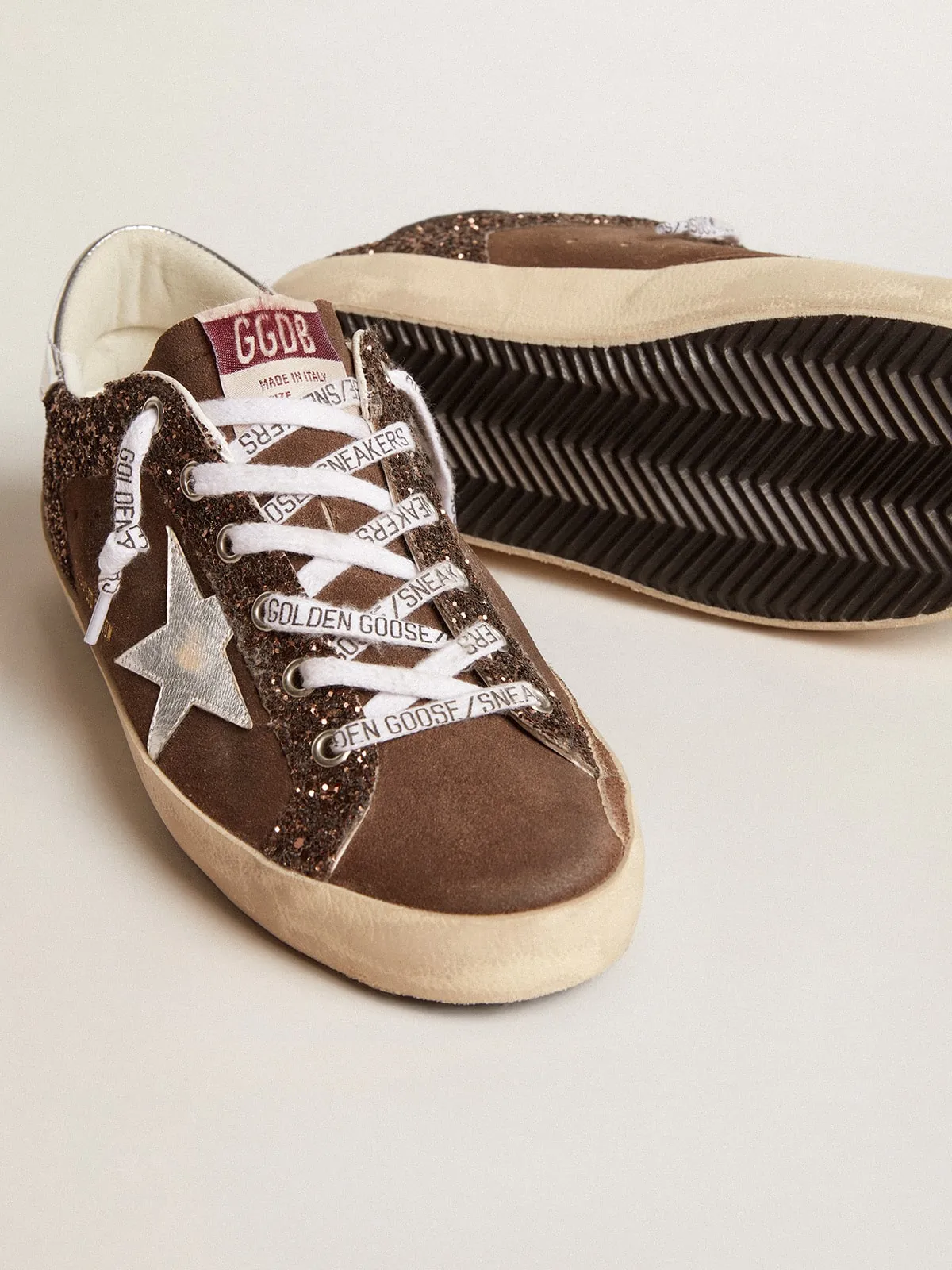 SUPERSTAR LTD CON PURPURINA MARRóN Y ANTE, CON ESTRELLA Y REFUERZO DEL TALóN DE PIEL